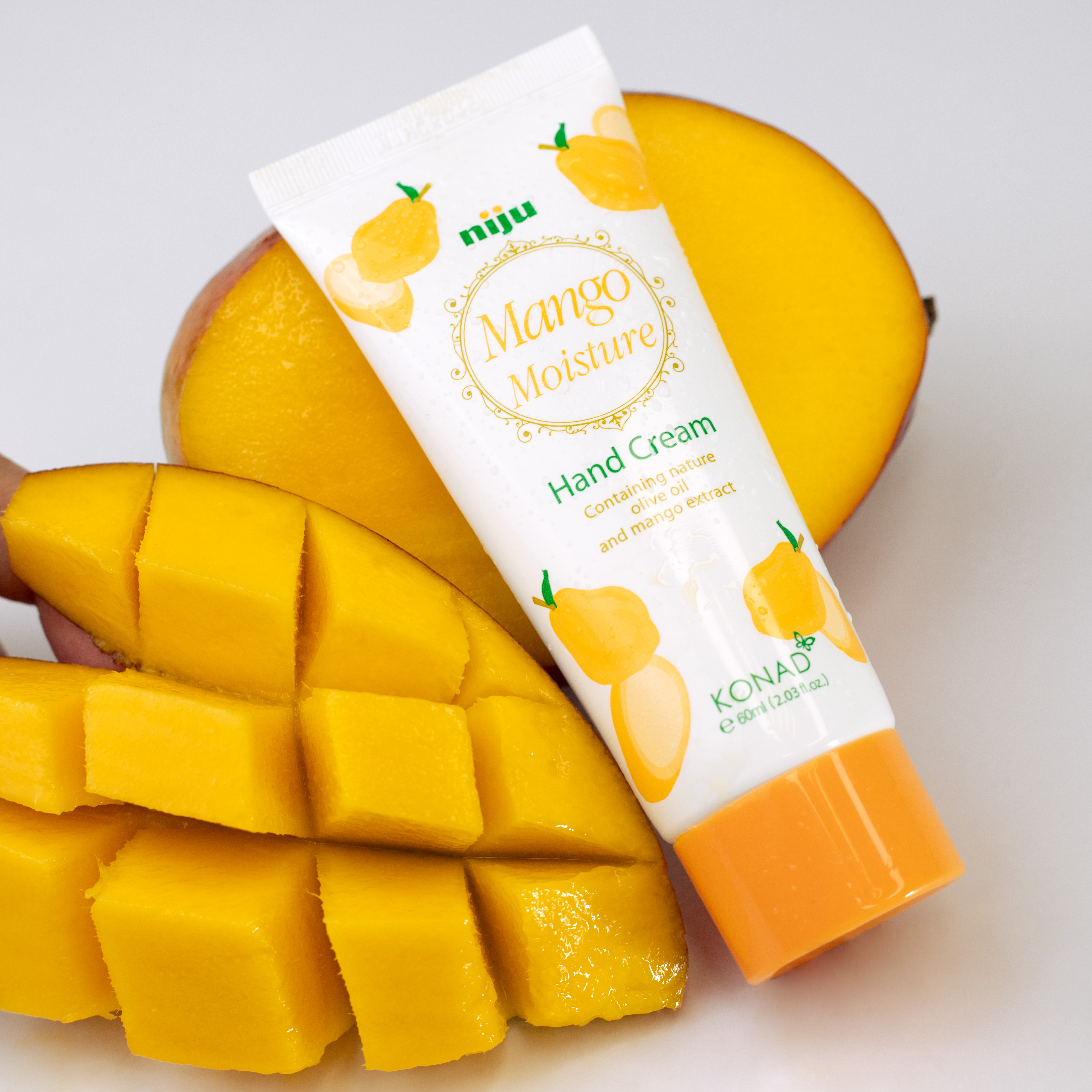 Konad Niju Moisture Hand Cream Mango Увлажняющий крем для рук c экстрактом манго, 60 мл купить в интернет-магазине Skin-Mag