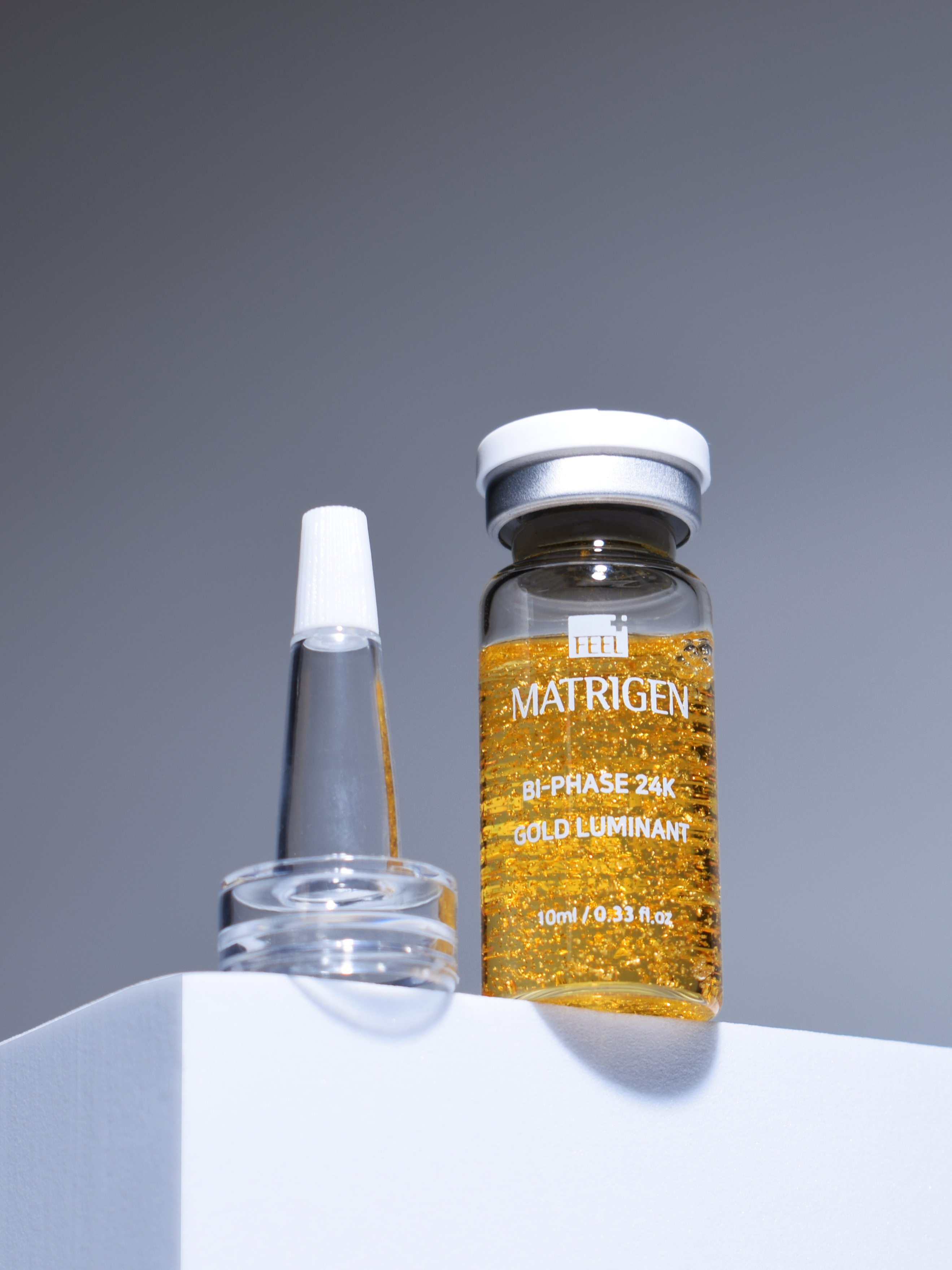 Matrigen Bi-Phase 24K Gold Luminant Ampoule Cыворотка для лица с золотом 24К и пептидами, 10 мл купить в интернет-магазине Skin-Mag